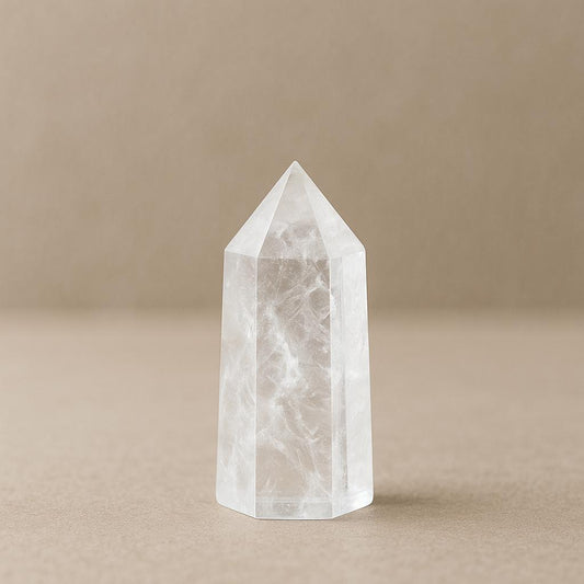 Natural Clear Quartz Single Point – A hand-carved hexagonal tower crystal that serves both as a powerful tool for meditation, energy healing, and spiritual growth, and as an elegant, pure decorative piece for your home.