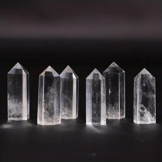 Natural Clear Quartz Single Point – A hand-carved hexagonal tower crystal that serves both as a powerful tool for meditation, energy healing, and spiritual growth, and as an elegant, pure decorative piece for your home.