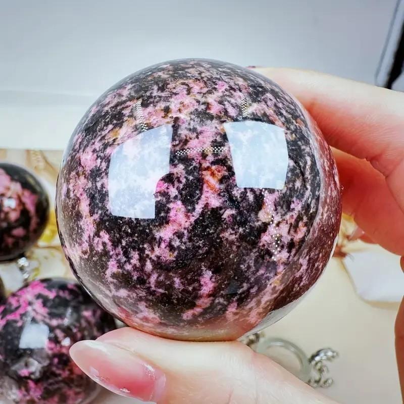 Natural Rhodonite Crystal Sphere – Polished Pink & Black Healing Stone for Emotional Balance & Heart Chakra